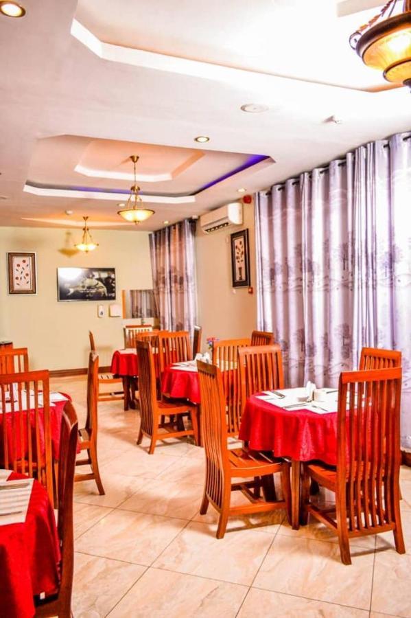 Grace Land Hotel Arusha Bagian luar foto