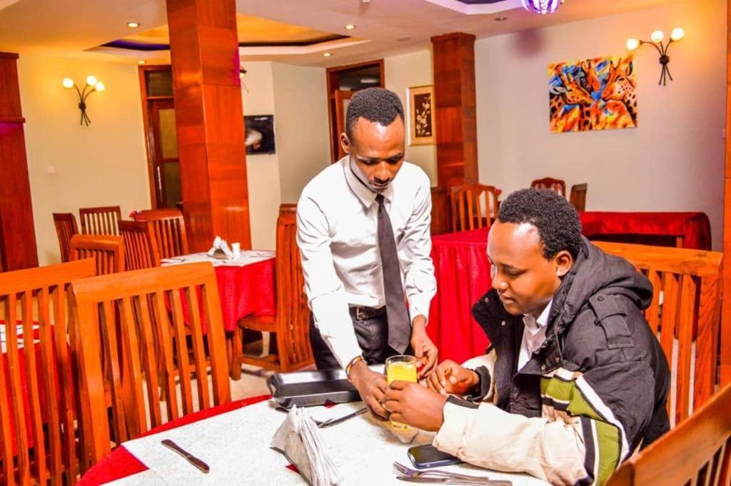 Grace Land Hotel Arusha Bagian luar foto