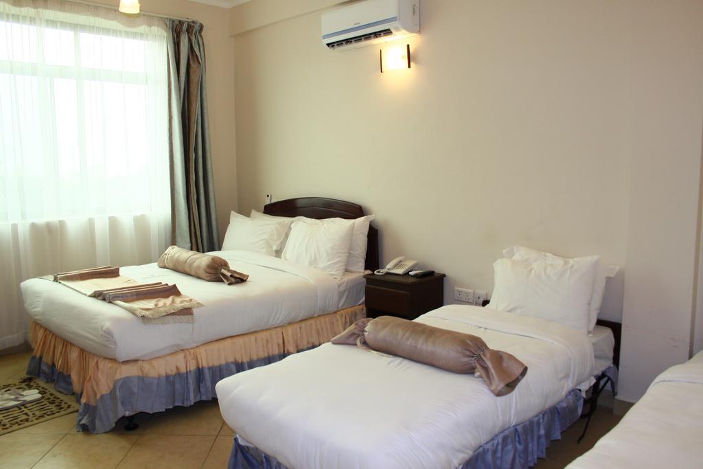 Grace Land Hotel Arusha Bagian luar foto