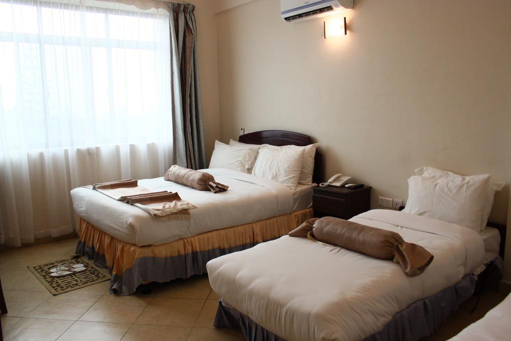 Grace Land Hotel Arusha Bagian luar foto