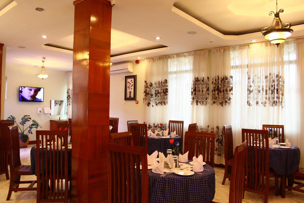 Grace Land Hotel Arusha Bagian luar foto