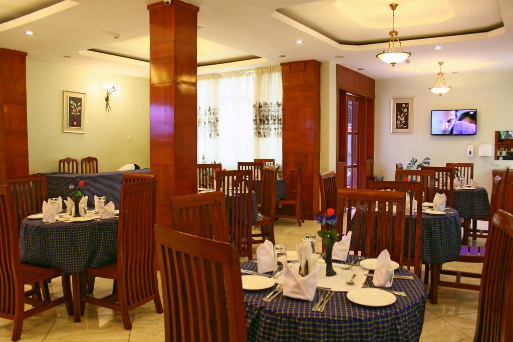 Grace Land Hotel Arusha Bagian luar foto